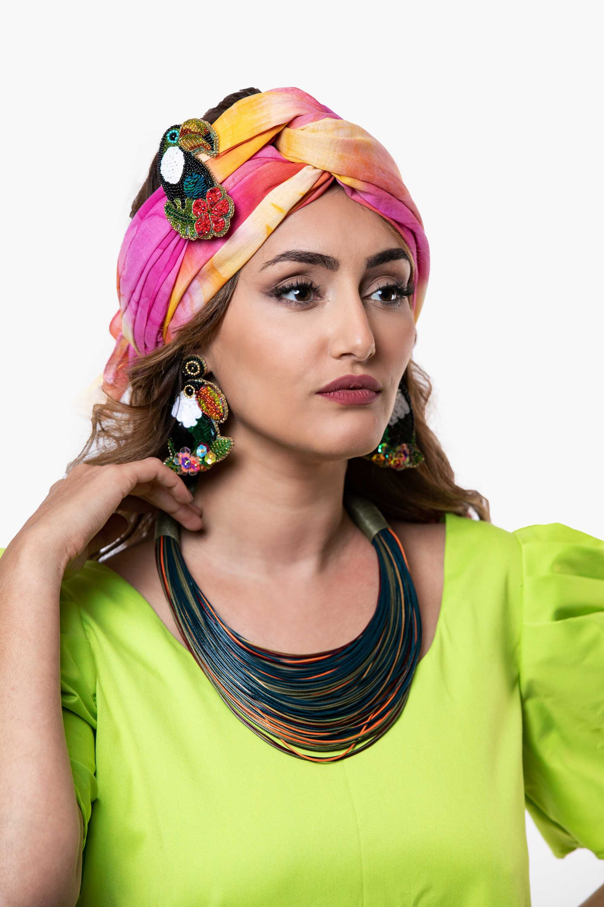 Pendientes en abalorios y lentejuelas