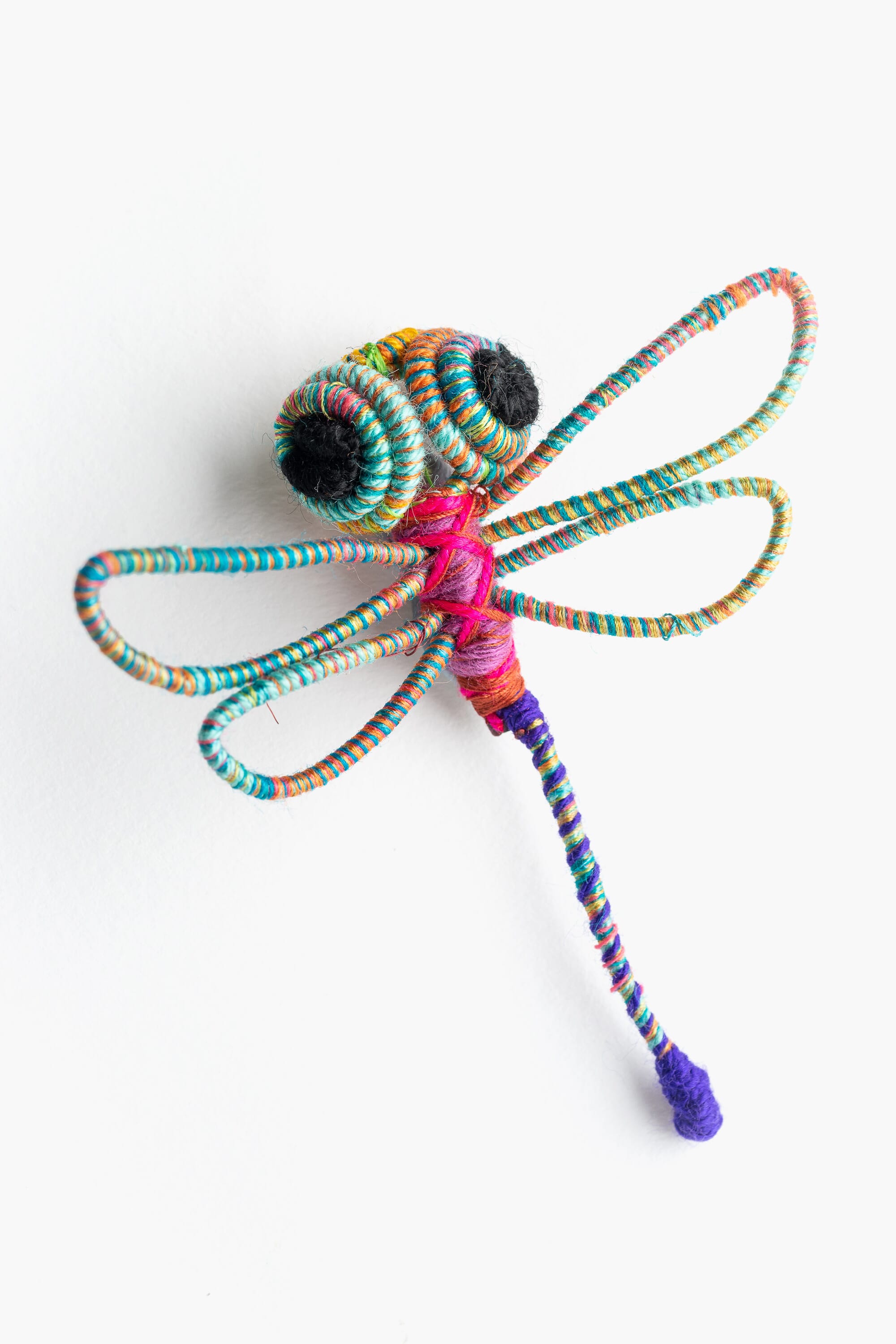 Broche en escultura textil