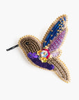 Broche en abalorios y lentejuelas