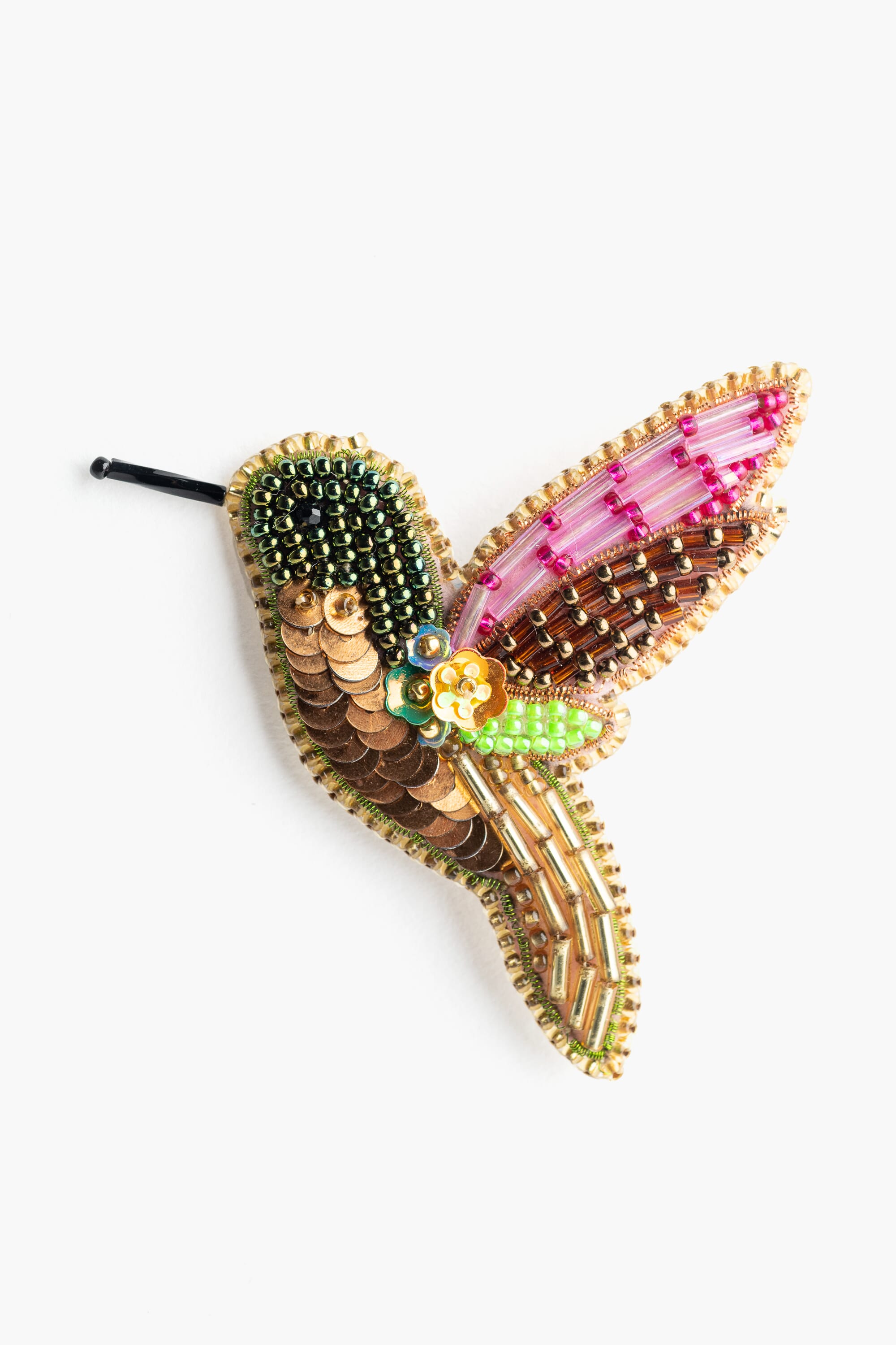 Broche en abalorios y lentejuelas