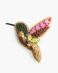 Broche en abalorios y lentejuelas