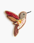 Broche en abalorios y lentejuelas