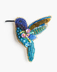 Broche en abalorios y lentejuelas