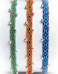 Pulsera hilos con bolitas plata