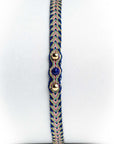 Pulsera hilos con dos bolitas de oro
