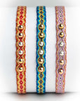 Pulsera hilos con bolitas plata y oro