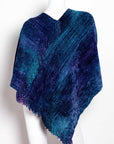 Poncho de bambú tejido en telar manual