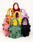 Bolso de hombro con pompones