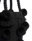 Bolso de hombro con pompones