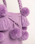 Bolso de hombro con pompones
