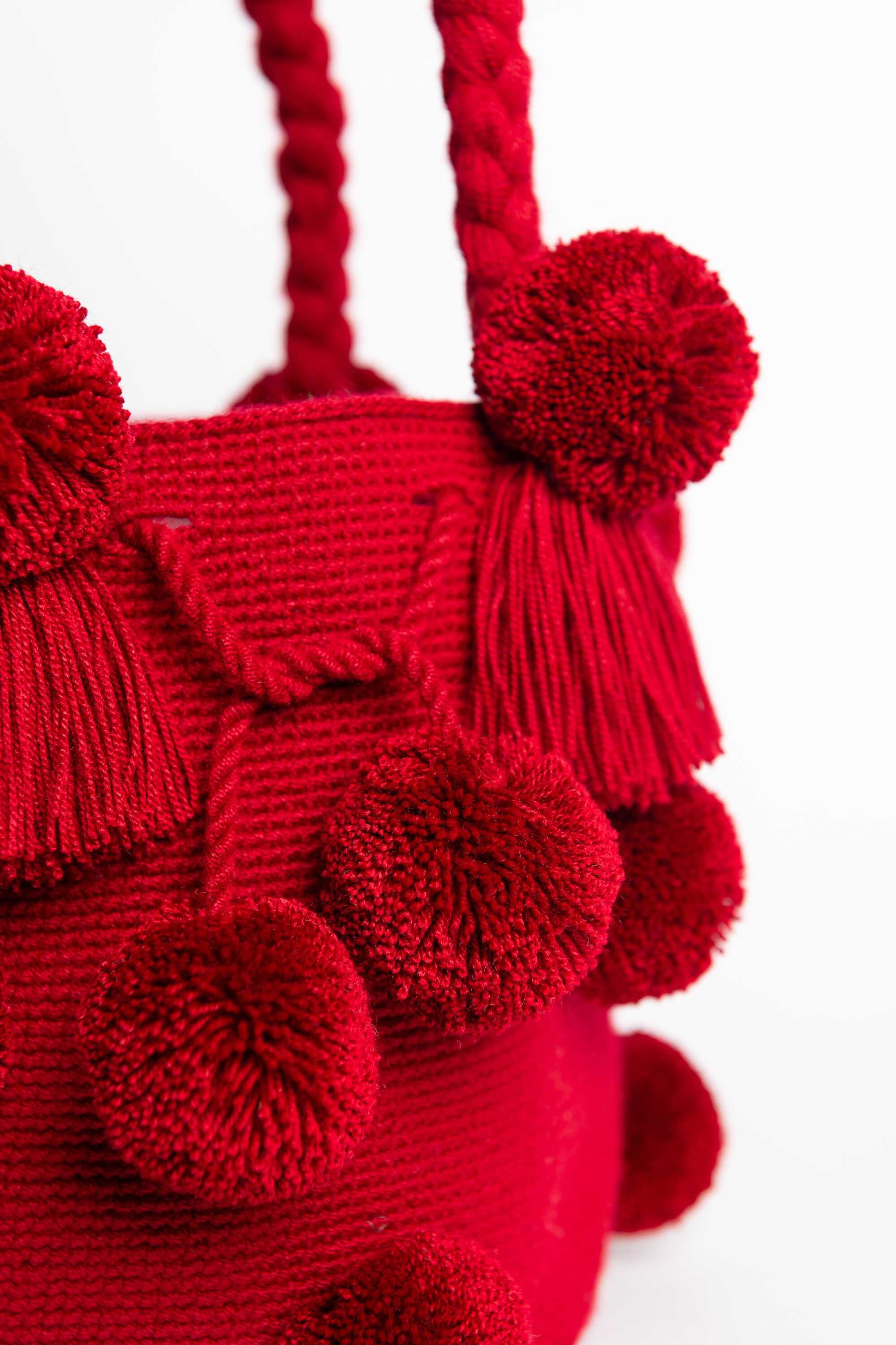 Bolso de hombro con pompones