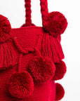 Bolso de hombro con pompones