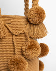 Bolso de hombro con pompones