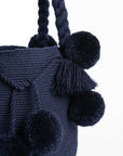 Bolso de hombro con pompones