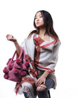 Bolso de hombro con pompones