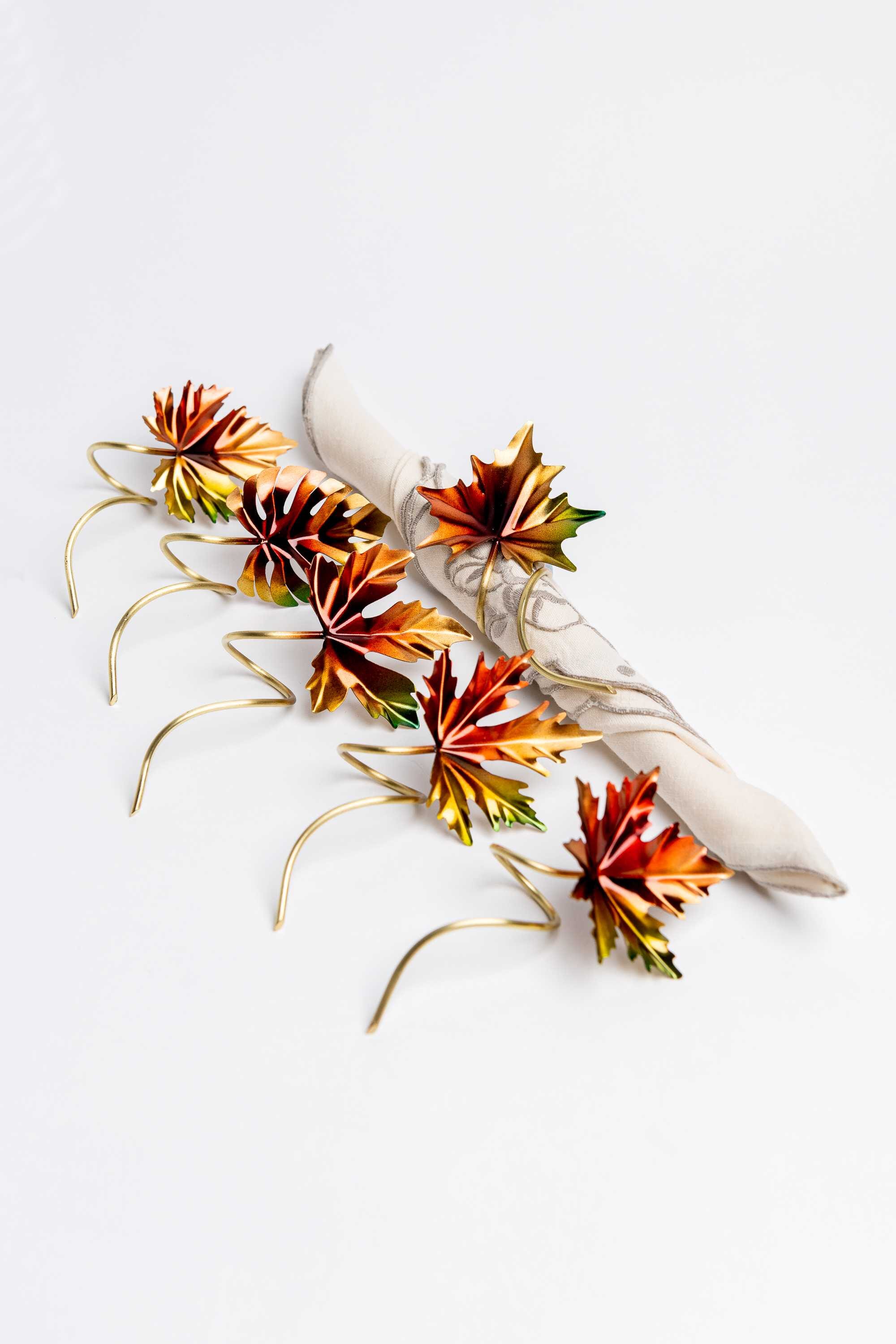 Juego de seis servilleteros en bronce