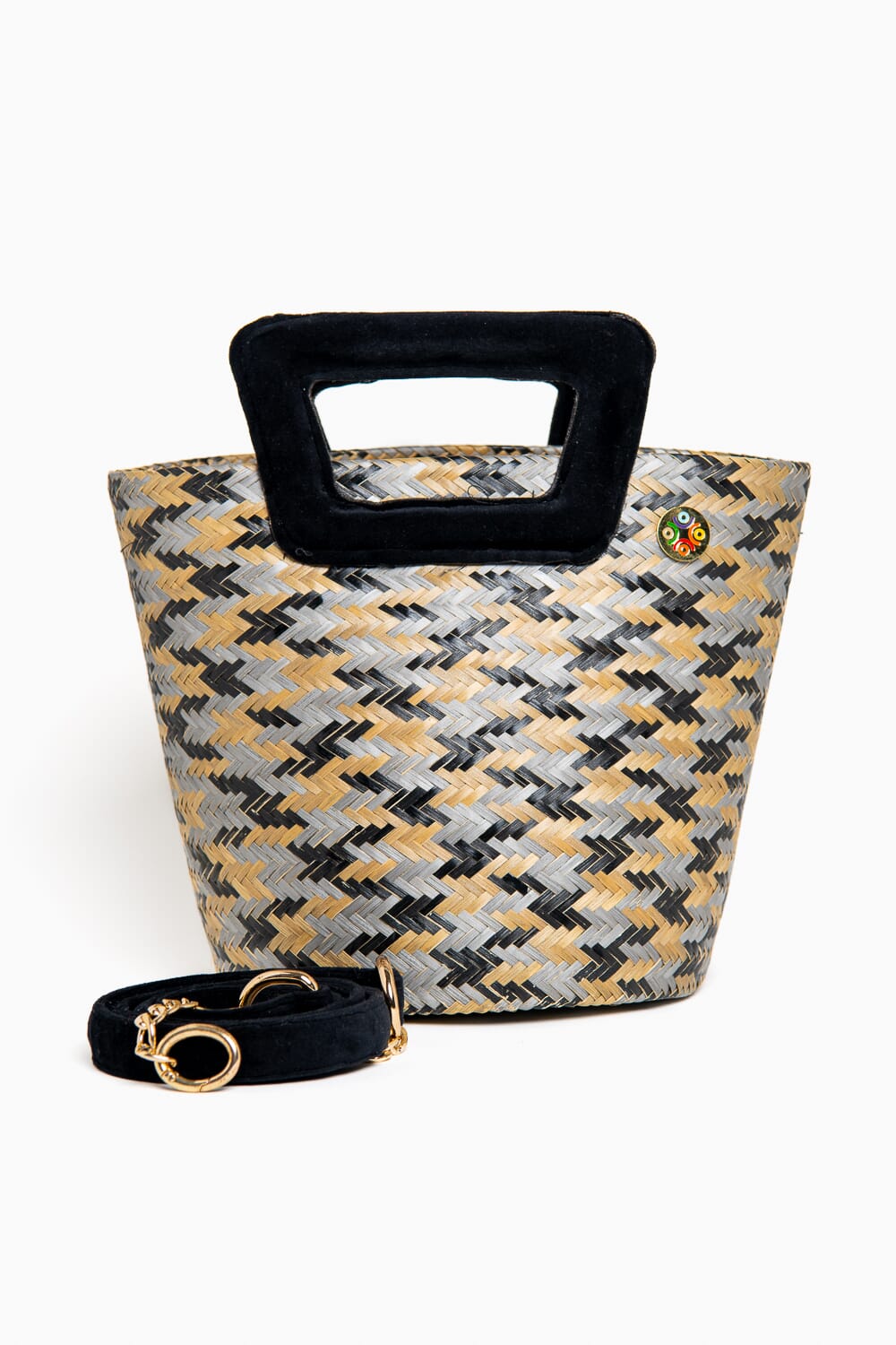Bolso en fibra vegetal y asas en terciopelo