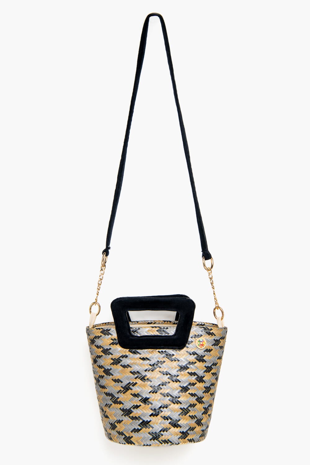 Bolso en fibra vegetal y asas en terciopelo