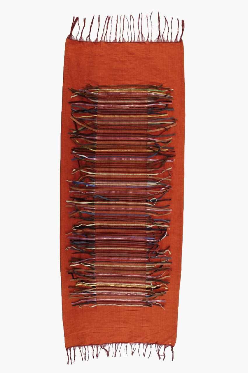 Pié de cama en lana y cuero