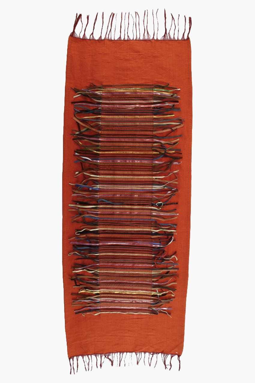 Pié de cama en lana y cuero