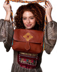 Bolso bandolera en cuero con asa Wayuu