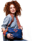 Bolso bandolera en cuero con asa Wayuu
