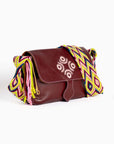 Bolso bandolera en cuero con asa Wayuu