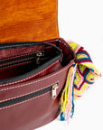 Bolso bandolera en cuero con asa Wayuu