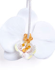 Pendientes orquídeas con cristal y seda