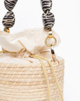Bolso de mano en fibra natural