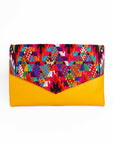 11Clutch mano en huipil y cuero
