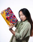 11Clutch mano en huipil y cuero