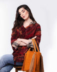 Bolso de hombro con flecos largos