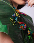 Broche en escultura textil
