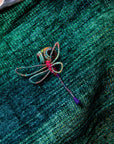 Broche en escultura textil