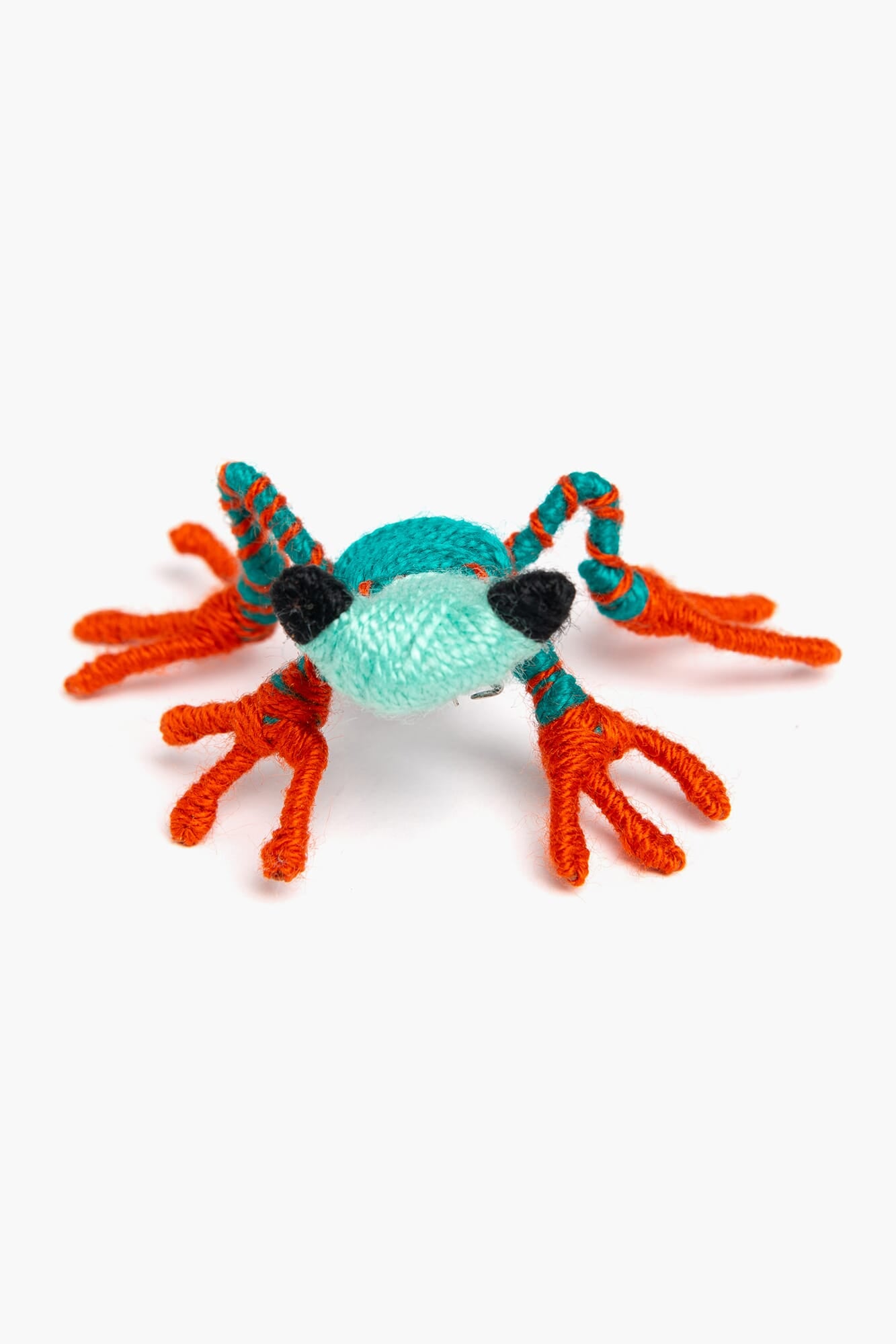 Broche en escultura textil