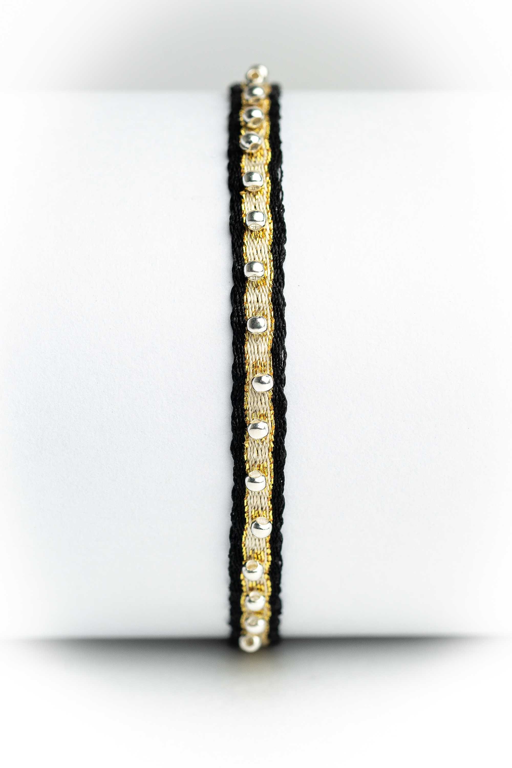 Pulsera hilos con bolitas plata
