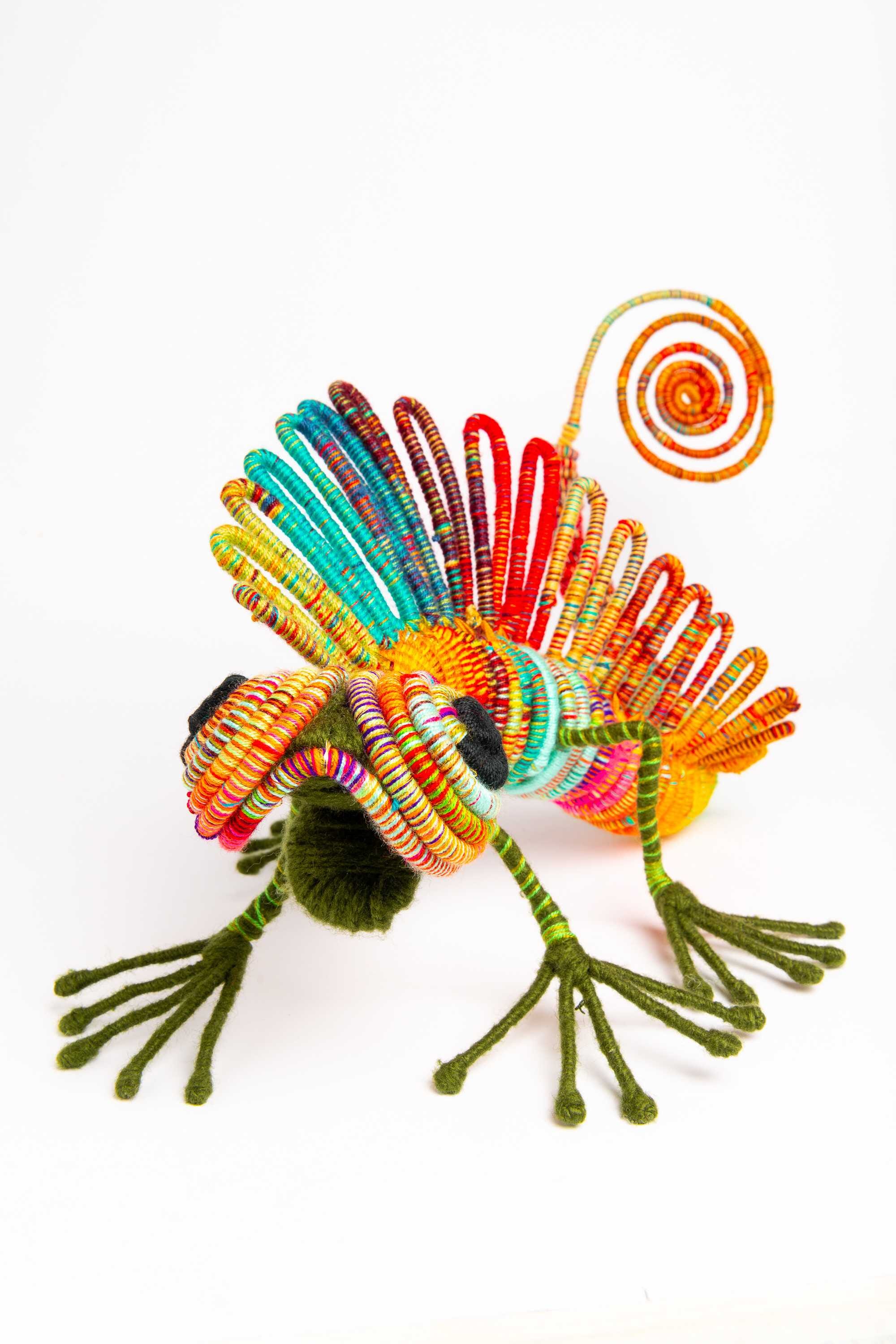 Iguana en escultura textil