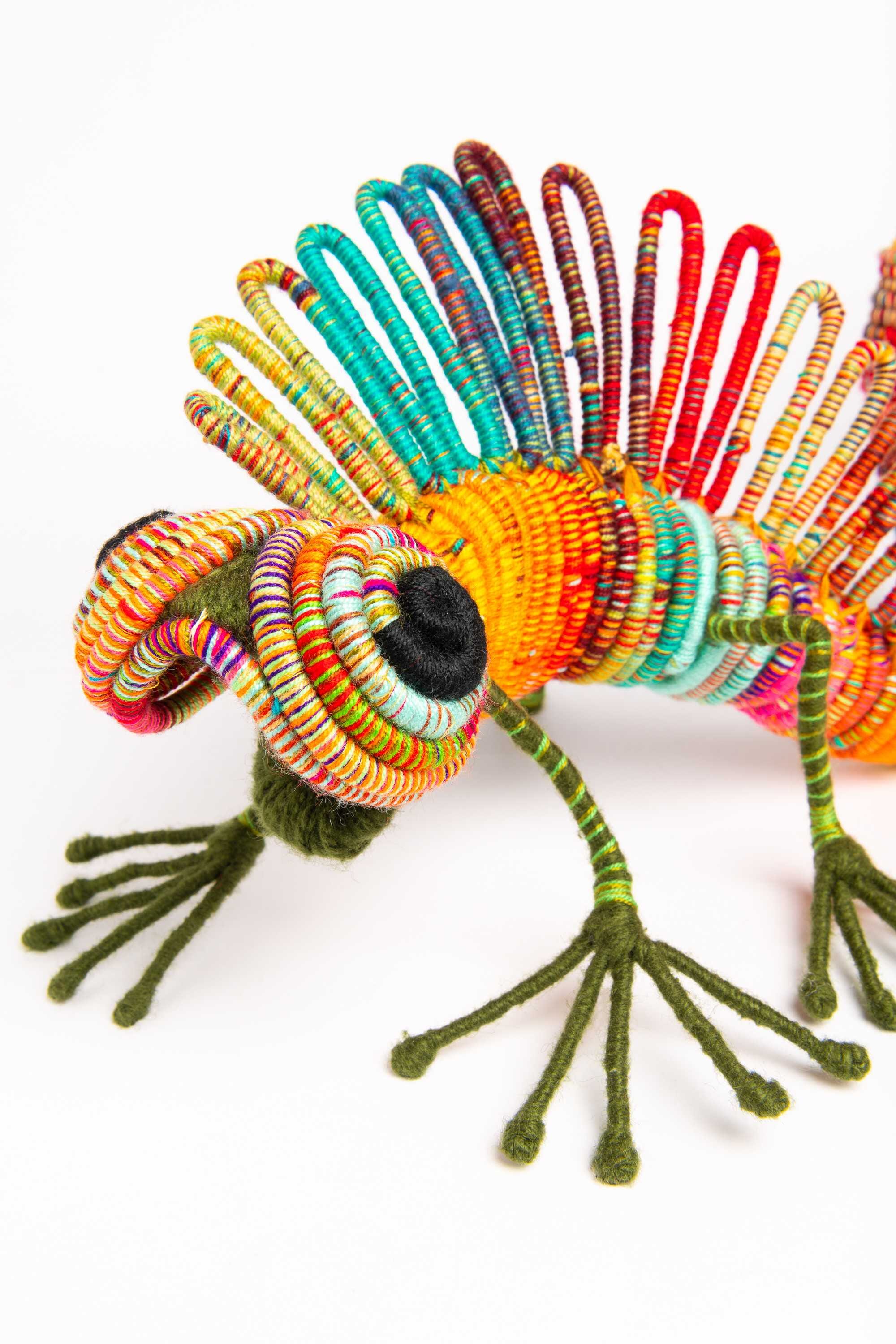 Iguana en escultura textil