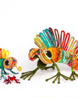 Iguana en escultura textil