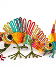 Iguana en escultura textil