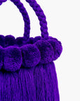 Bolso con pompones y borlas de algodón

