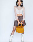 Bolso con pompones y borlas de algodón
