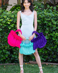Bolso con pompones y borlas de algodón
