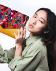 11Clutch mano en huipil y cuero